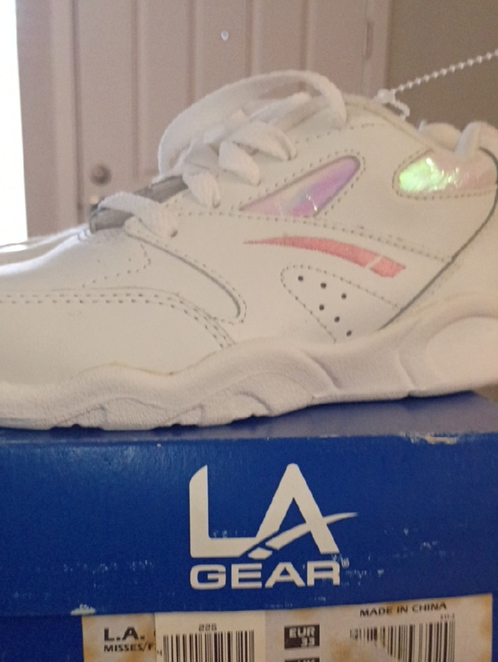 L.A. Gear White Sneakers with Iridescent Pink and Green Accents